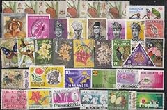 Malaisie 100 timbres d'occasion  Livré partout en France