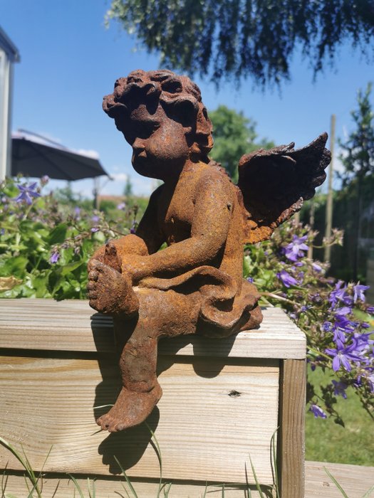 Figurine sitting angel for sale  