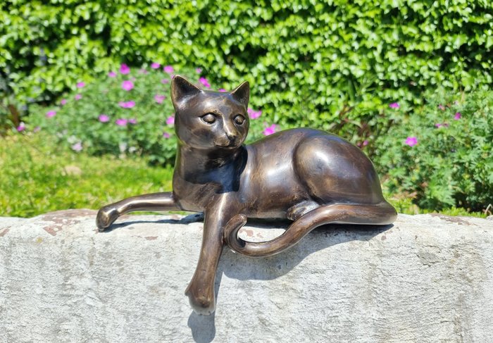 Figurine resting cat for sale  