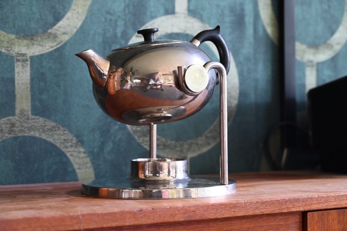 Tea pot tilting for sale  