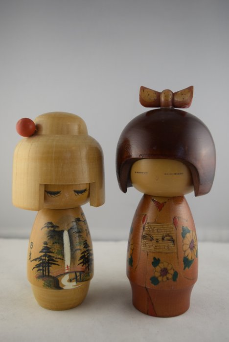 Two kokeshi made for sale  