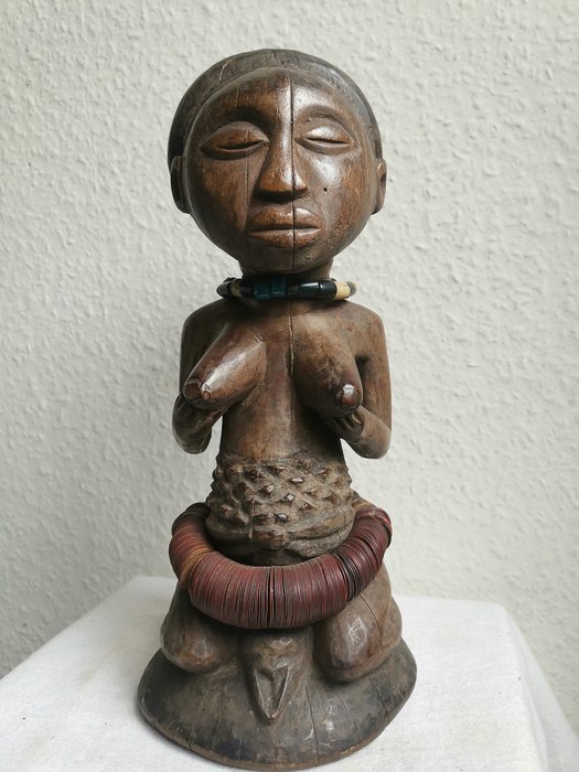 Statue wood cowries for sale  