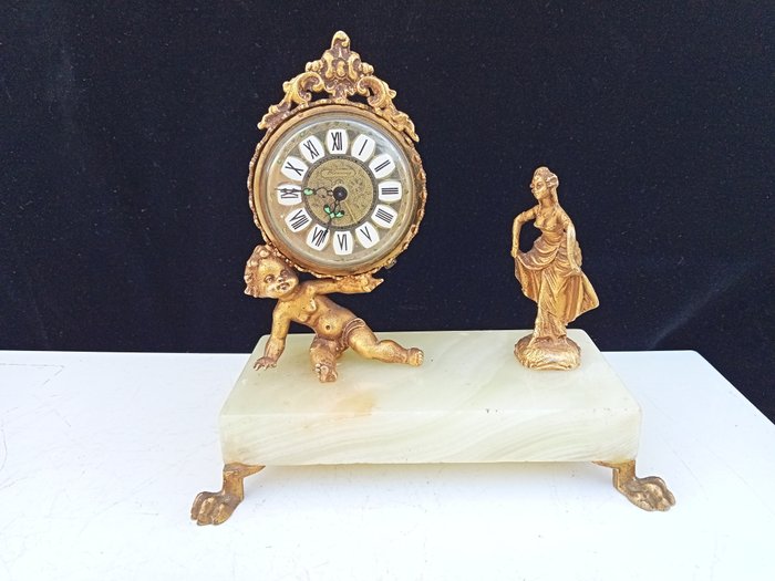 Table clock putto for sale  