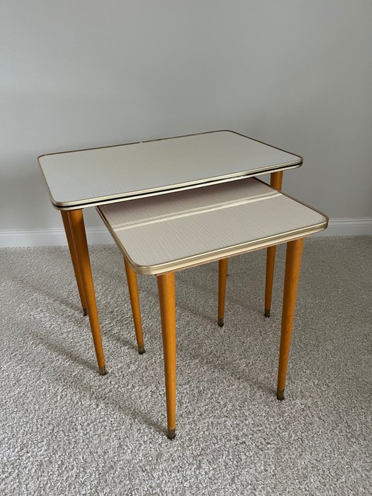 Nesting tables material for sale  