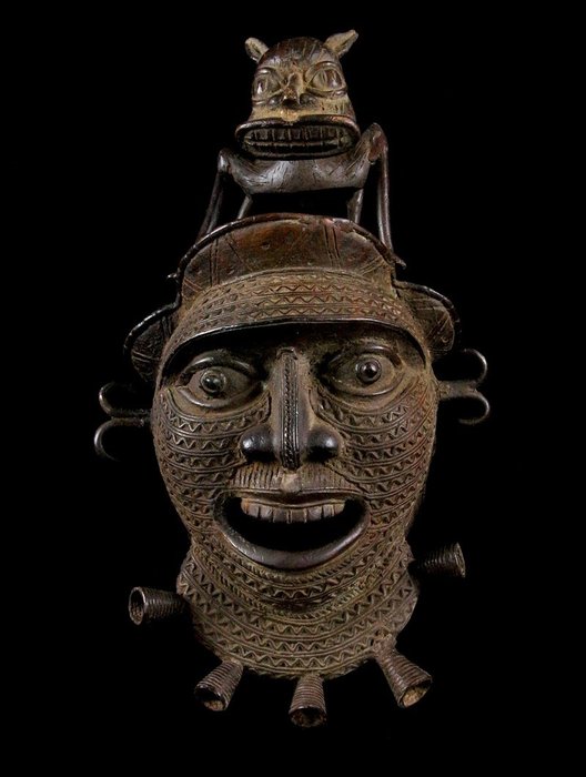 Bronze mask stand d'occasion  