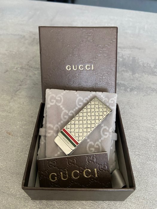 Gucci clip argento usato  