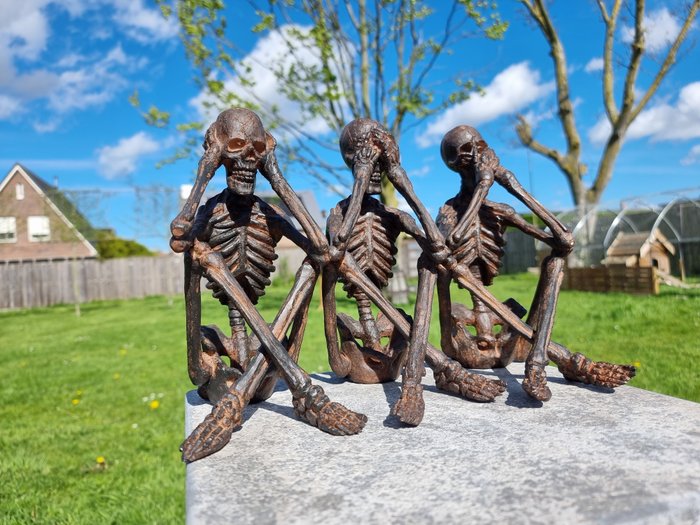 Statue skeletons hear for sale  