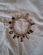 Bracelet breloques desire d'occasion  Mayenne