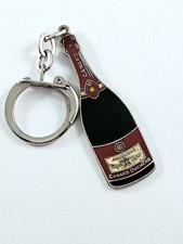 Porte cles champagne d'occasion  L'Absie
