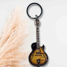 Porte clés guitare d'occasion  Tremblay-en-France