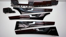 Audi A8 4H deska rozdzielcza + listwy ozdobne drzwi czarne/orzechowe na sprzedaż  PL