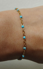Bracelet femme doré d'occasion  Saint-Maur-des-Fossés