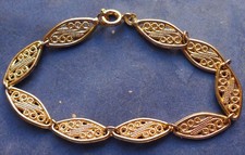 Petit bracelet doré d'occasion  Rochefort