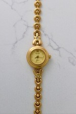 Usado, Relógio de quartzo feminino Polaire tom dourado – Pulseira decorativa com detalhes em strass comprar usado  Enviando para Brazil
