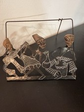 Escultura sudafricana de metal y caras talladas en madera por Daniel Novela segunda mano  Embacar hacia Mexico