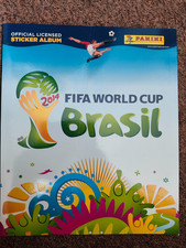 FIFA World Cup 2014 +Panini Sammelbilderalbum+ mit ungeklebtem Messi-Sticker comprar usado  Enviando para Brazil