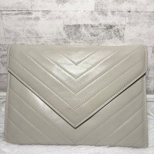 Autentica pochette yves usato  Spedire a Italy