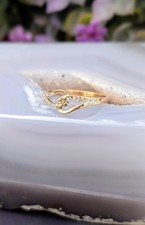 Bague rubans entrelacés d'occasion  Les Mureaux