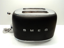 Smeg Retro 2-Slice Toaster Matte Black, Chrome TSF01BLMUS READ (Cracked Element) na sprzedaż  Wysyłka do Poland