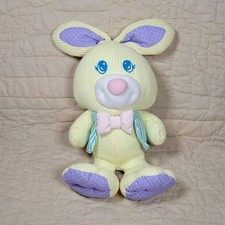 Waffle de pelúcia Fisher Price Cozies amarelo coelho 1997 roxo verde colete arco comprar usado  Enviando para Brazil
