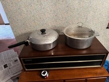 2 potes Wagner Ware Sydney MAGNALITE.  3 tampas.  Forno holandês. Fritadeira. Alumínio vintage comprar usado  Enviando para Brazil