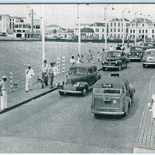 Usado, Cartão postal c1950s Willemstad, Curaçao novo com etiquetas ponte pontão tráfego KLM van carros A370 comprar usado  Enviando para Brazil