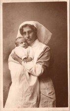 Rppc nurse holding d'occasion  Expédié en Belgium