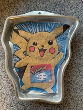 Panela de bolo vintage 1999 Wilton Pokemon Pikachu com instruções impressas comprar usado  Enviando para Brazil