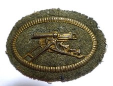 Insigne bras mitrailleur d'occasion Insigne bras mitrailleur d'occasion  Mézières-sur-Issoire