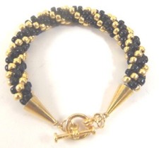 Black and gold d'occasion Black and gold d'occasion  Expédié en France