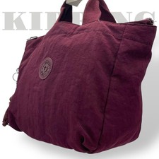 Kipling bordeaux nylon d'occasion  Expédié en Belgium