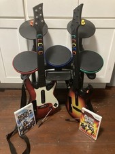 Wii Guitar Hero conjunto de bateria com 2 guitarras 2 jogos sem pedal vem com bastões comprar usado  Enviando para Brazil