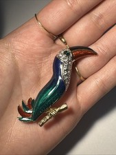 Broche toucan doré d'occasion  Andernos-les-Bains
