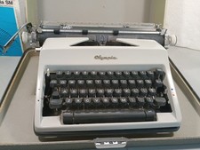 Usado, MÁQUINA DE ESCREVER OLYMPIA DELUXE SM estojo cinza escovas de fita extra borrachas manuais  comprar usado  Enviando para Brazil