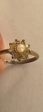 Bague forme rosace d'occasion  Saint-Mandé