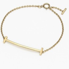 Preço promocional: £ 1100 18k pulseira Tiffany & Co T sorriso ouro amarelo luxo coquette bebê comprar usado  Enviando para Brazil