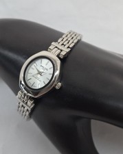 Reloj de cuarzo para mujer Salco pulsera tono plata caja ovalada esfera analógica acento negro segunda mano  Embacar hacia Mexico