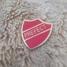Badges plus red for sale  EASTBOURNE