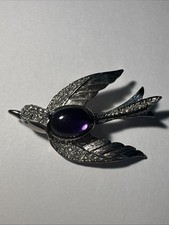 Broche oiseau argentée d'occasion  Andernos-les-Bains