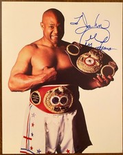Foto autografada assinada por George Foreman com certificado de autenticidade ícone campeão boxeador peso pesado comprar usado  Enviando para Brazil