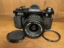 *Quase Perfeito* Câmera de Filme Preta Programa Canon AE-1 Nova FD NFD 28mm F/2.8 De JP comprar usado *Quase Perfeito* Câmera de Filme Preta Programa Canon AE-1 Nova FD NFD 28mm F/2.8 De JP comprar usado  Enviando para Brazil