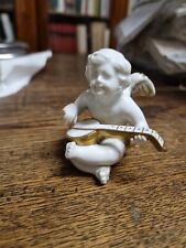 Statuina putto musicante usato  Bologna