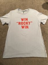 Camisa mediana Win “Rocky” Win ropa oficial marca de Sylvester Stallone adulto, usado segunda mano  Embacar hacia Argentina