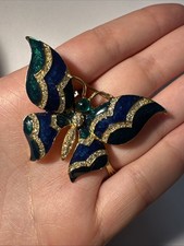 Broche papillon doré d'occasion  Andernos-les-Bains