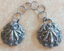 Attaches cape argent. d'occasion  Saintes