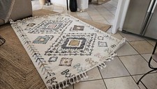 Tapis franges crème d'occasion  Castries