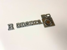 1975 - 1980 Chevrolet C/K20 BONANZA 20 emblema emblema emblema para-lama dianteiro OEM quebra limpa comprar usado  Enviando para Brazil