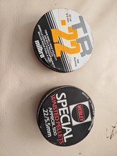 Two open tins for sale  AXBRIDGE
