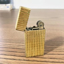 Briquet métal doré d'occasion  Saint-Genest-Malifaux
