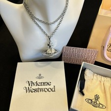 Vivienne westwood pearl d'occasion  Expédié en Belgium
